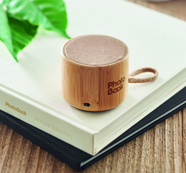 Logotrade promotional gifts photo of: Round bamboo wireless speaker