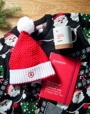 Logotrade firmakingitused pilt: Jõulu sümboolikaga kootud müts